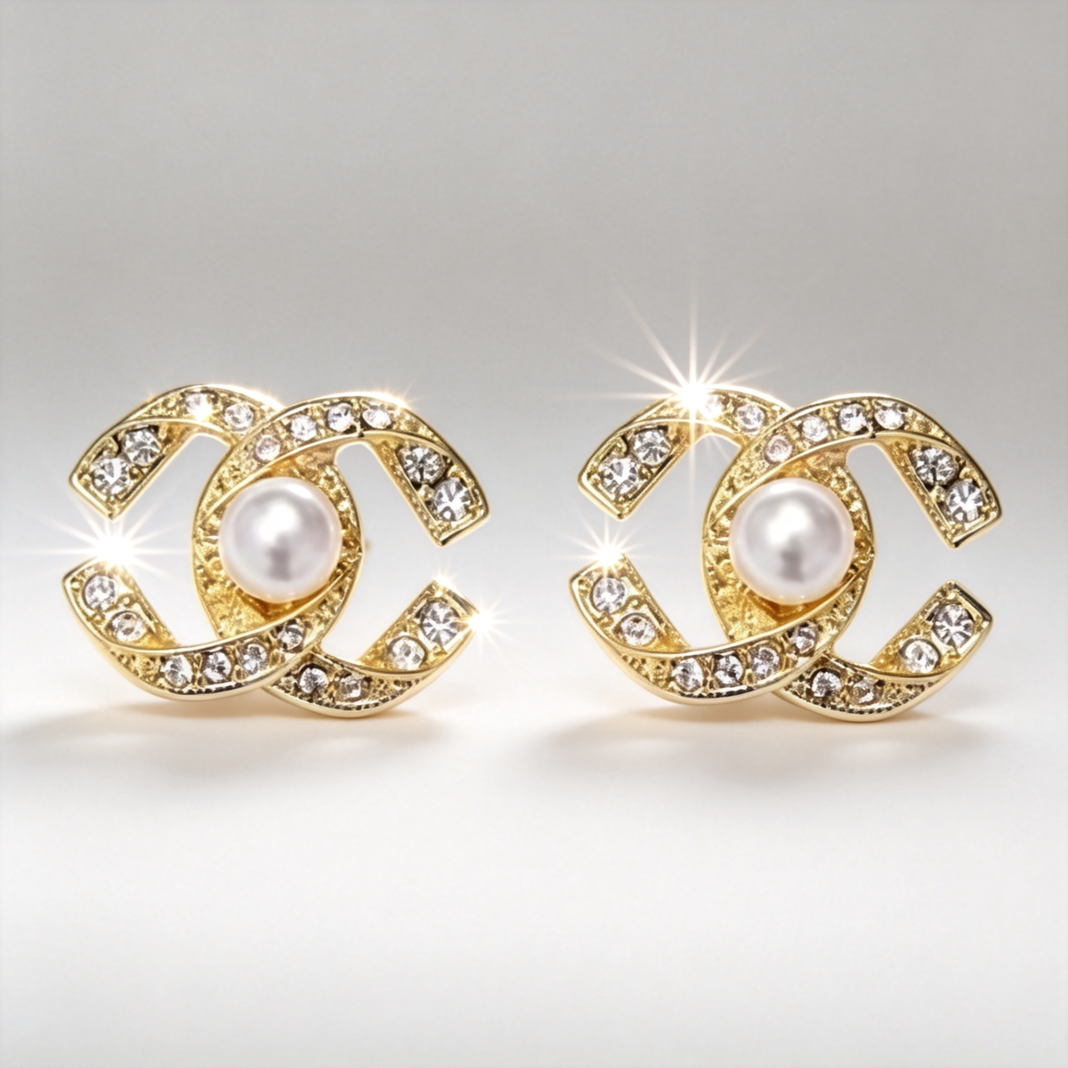 🎀 Pearl Stud Earrings | Gold-Tone Chic Jewelry | Crystal Logo-Inspired Glow
